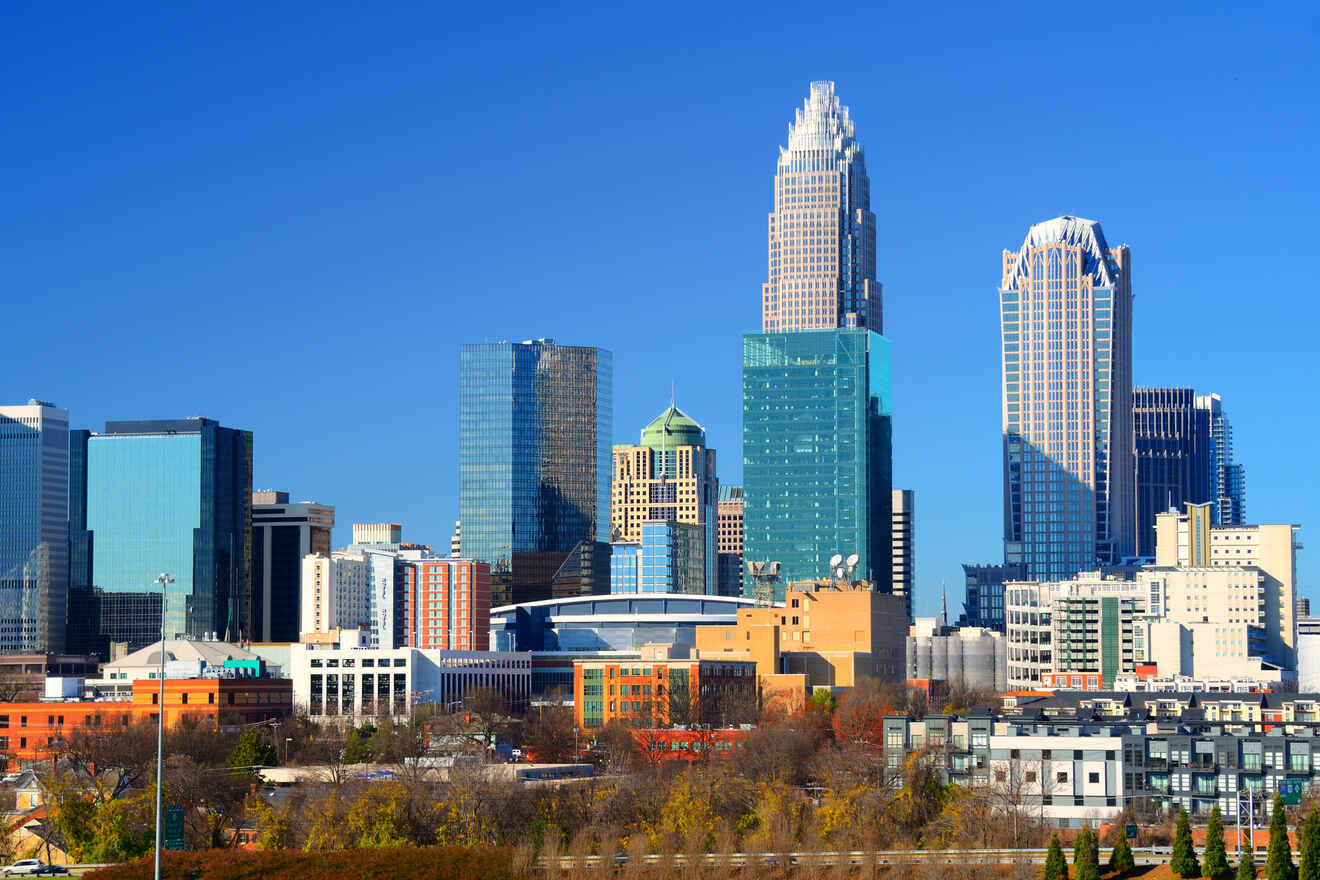 Charlotte skyline with clear blue skies showcasing prominent skyscrapers and modern architecture